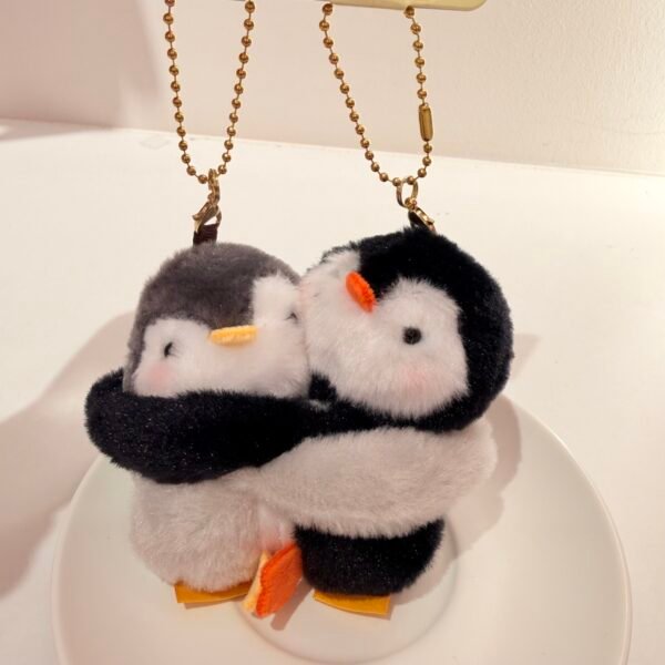 Llavero pingüino pareja