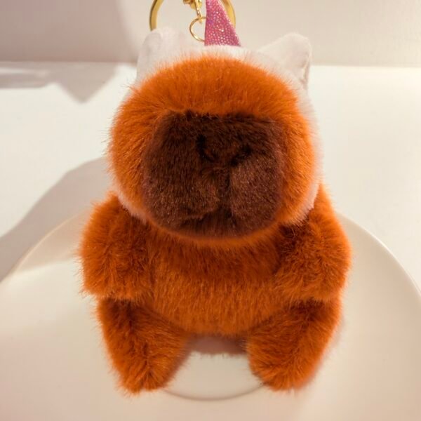 Llavero capybara conejo