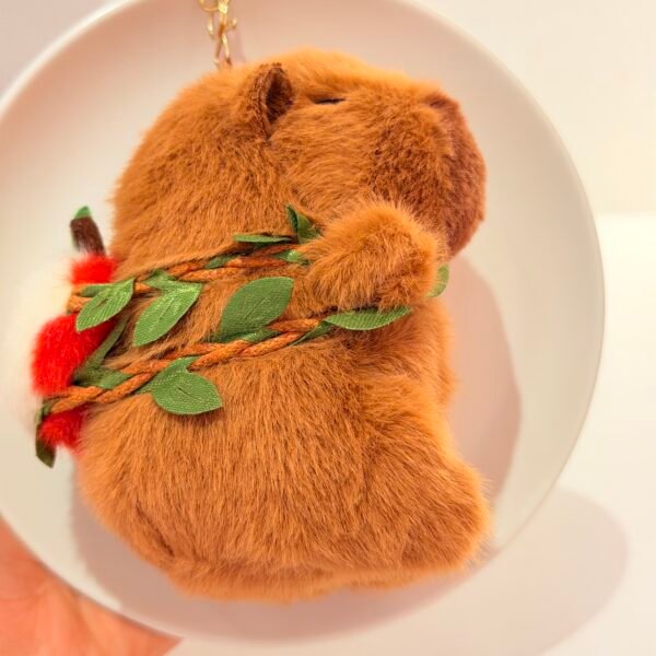 Llavero capybara manzana