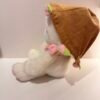 Peluche conejo con flor