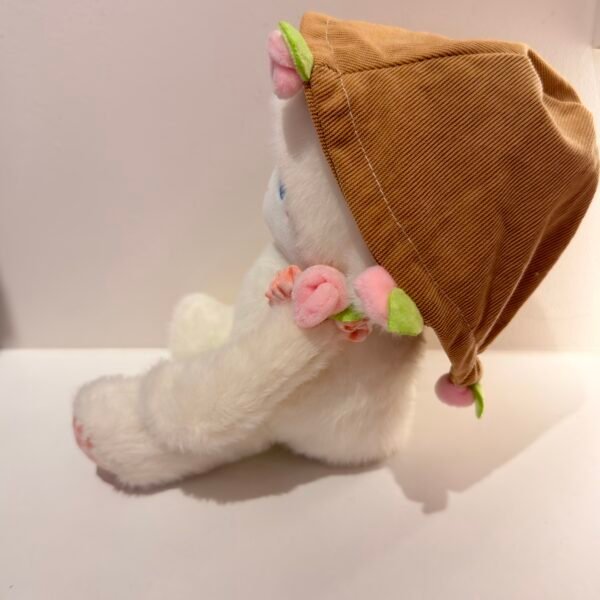 Peluche conejo con flor
