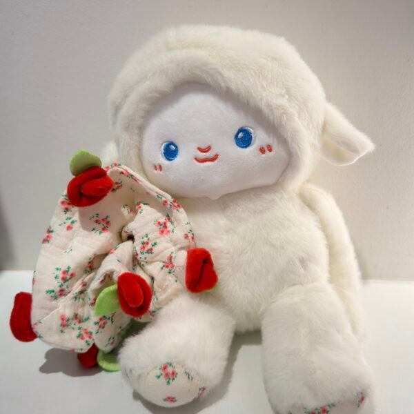 Peluche conejo con flor