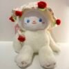 Peluche conejo con flor