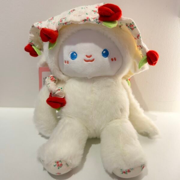Peluche conejo con flor