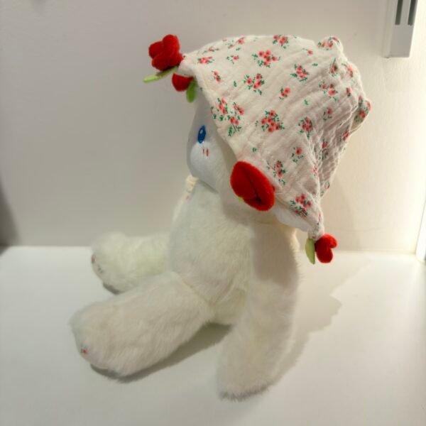 Peluche conejo con flor