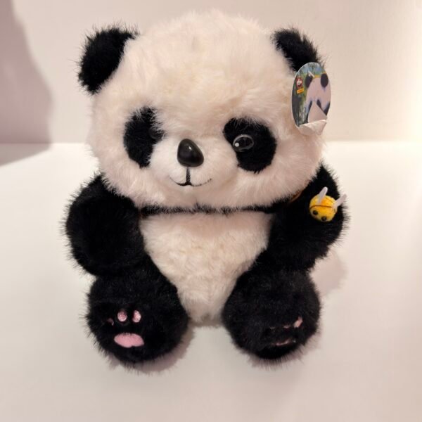 Peluche panda con mochila de manzana