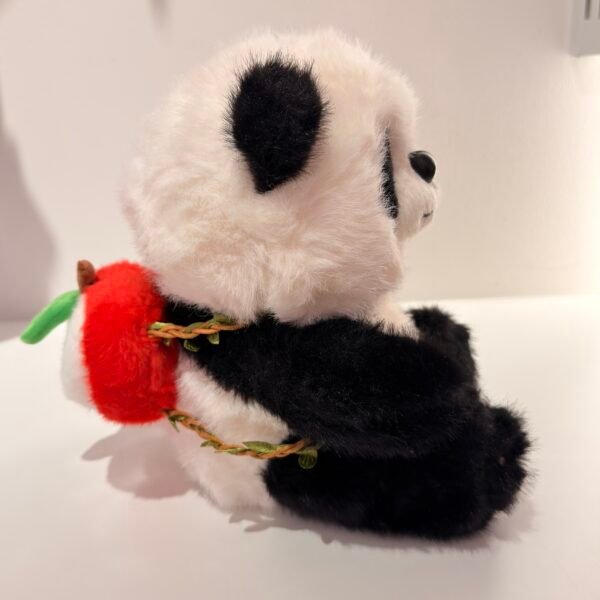 Peluche panda con mochila de manzana
