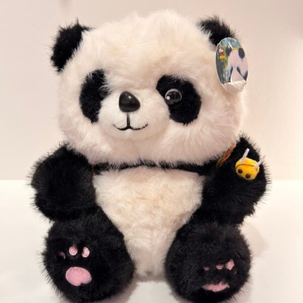 Peluche panda con mochila de manzana