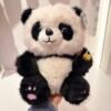 Peluche panda con mochila de manzana