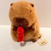 Peluche de capybara con tanghulu