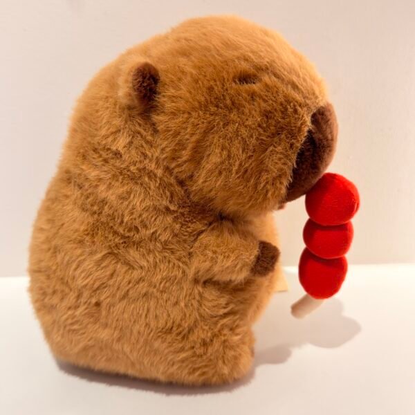Peluche de capybara con tanghulu