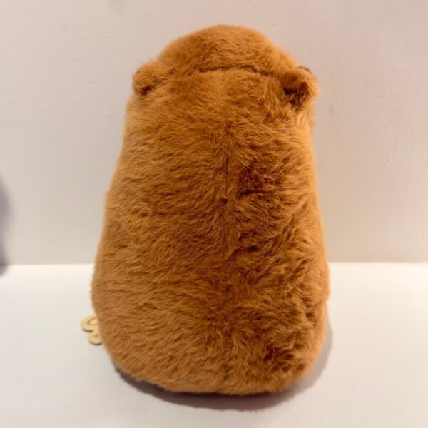 Peluche de capybara con tanghulu
