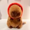 Peluche de capybara capucha fresa