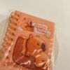 Minilibreta de capybara con líneas
